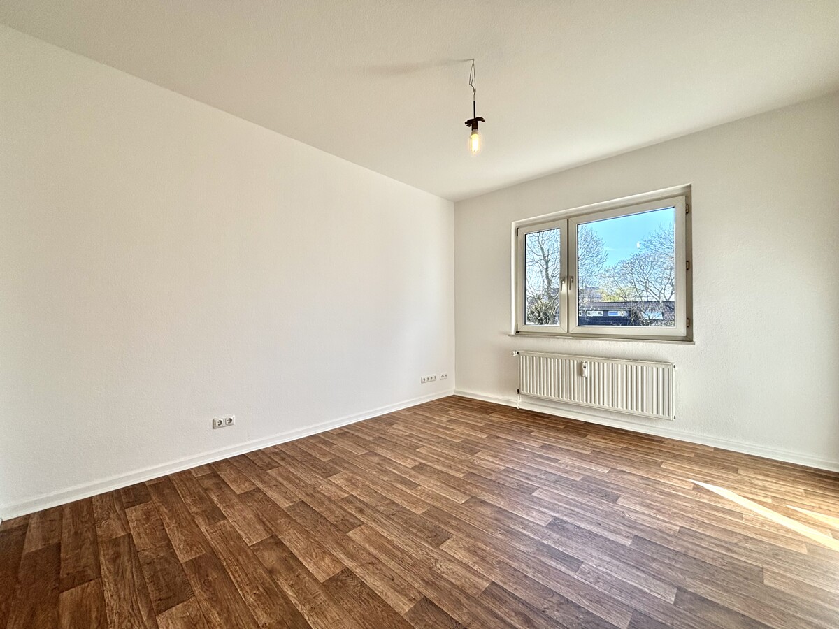 Frisch renovierte 2-Zimmer-Wohnung mit Gemeinschaftsgarten und praktischem Stauraum